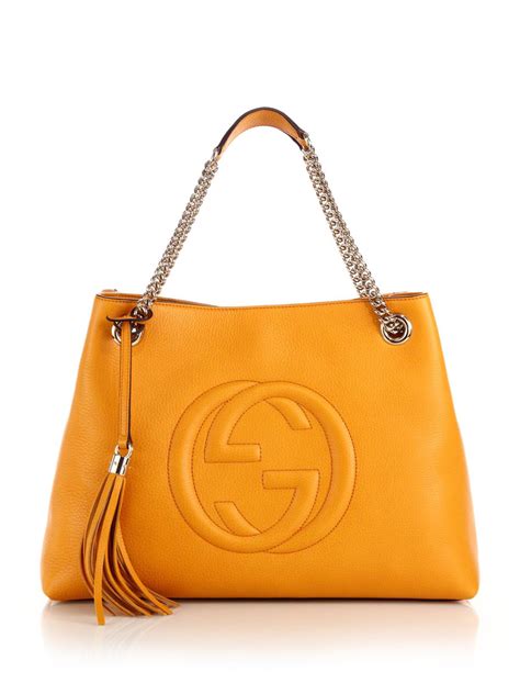 gucci shoes yellow log|white gucci handbag.